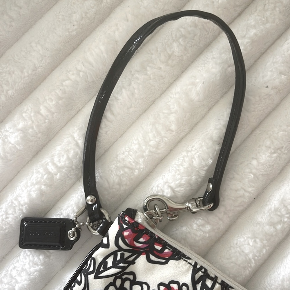 Coach Poppy Floral Wristlet with Black and Red Accents EUC
No Callouts - Picture 8 of 10